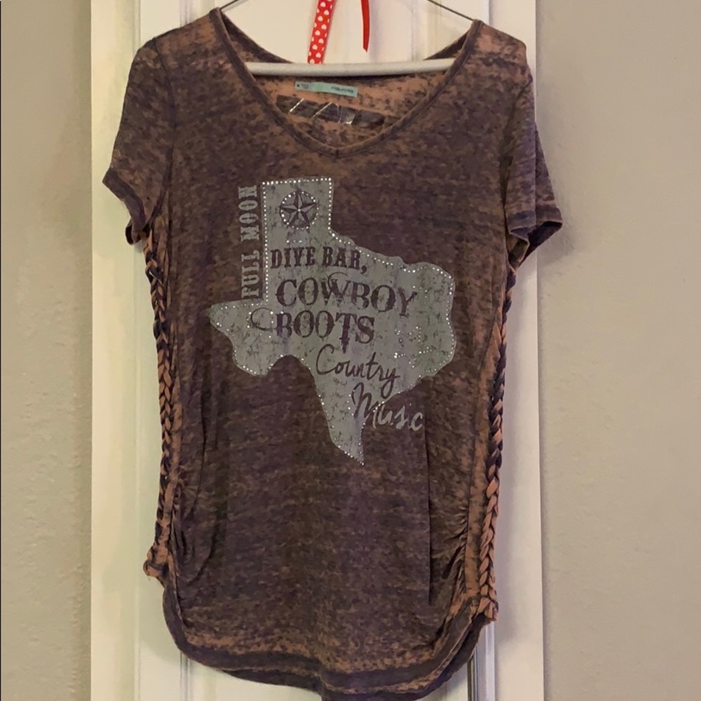 Used great condition distressed short sleeved